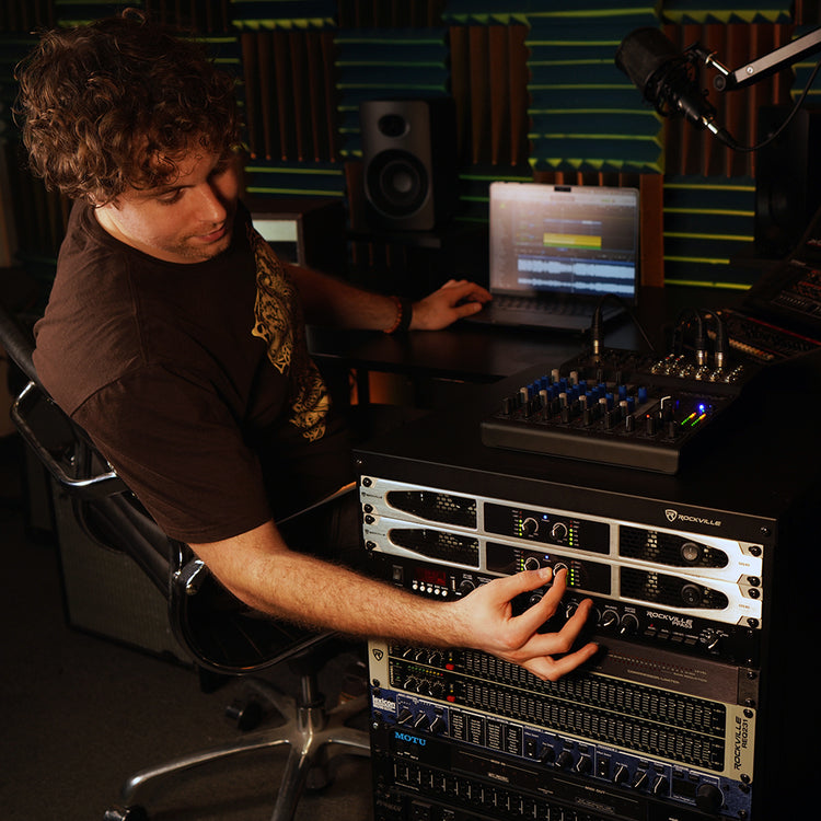 A Producer Adjusting the Volume Knob on the Rockville DS10
