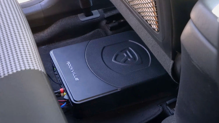 Car audio system installed in a vehicle with a visible brand logo.