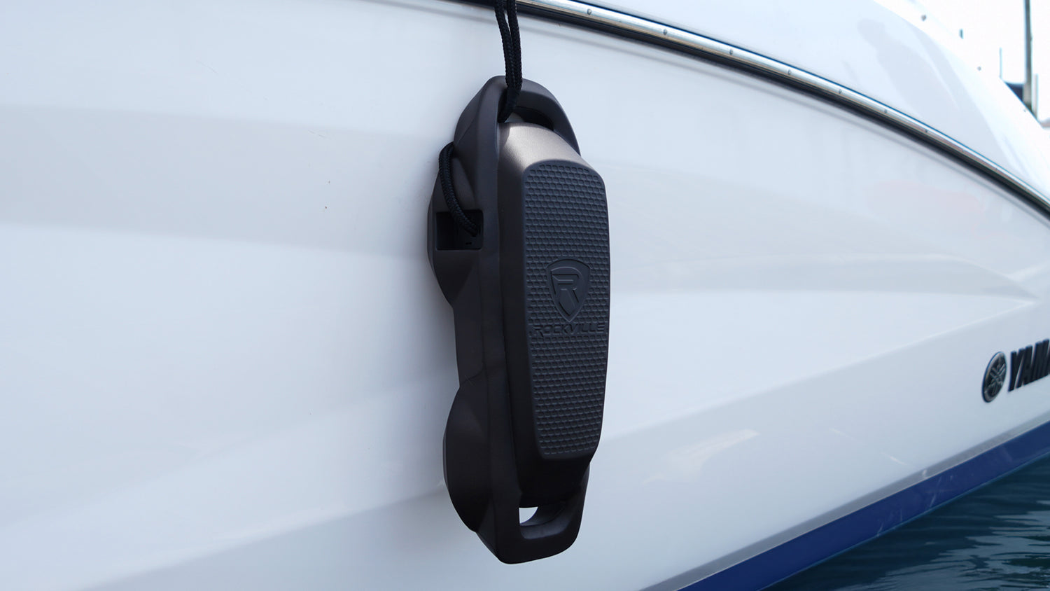 Black handle on a white boat with.